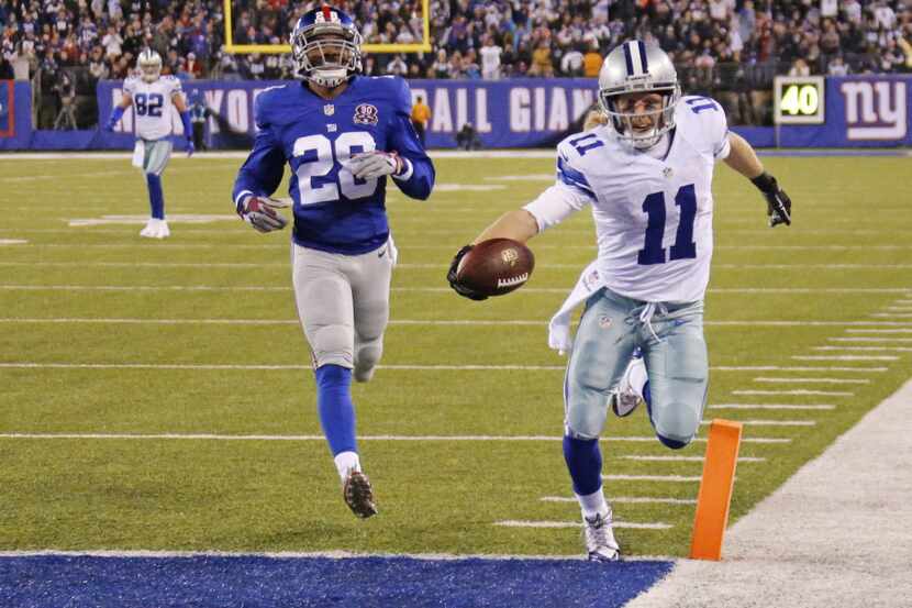 Dallas Cowboys wide receiver Cole Beasley (11) glides into the end zone as New York Giants...