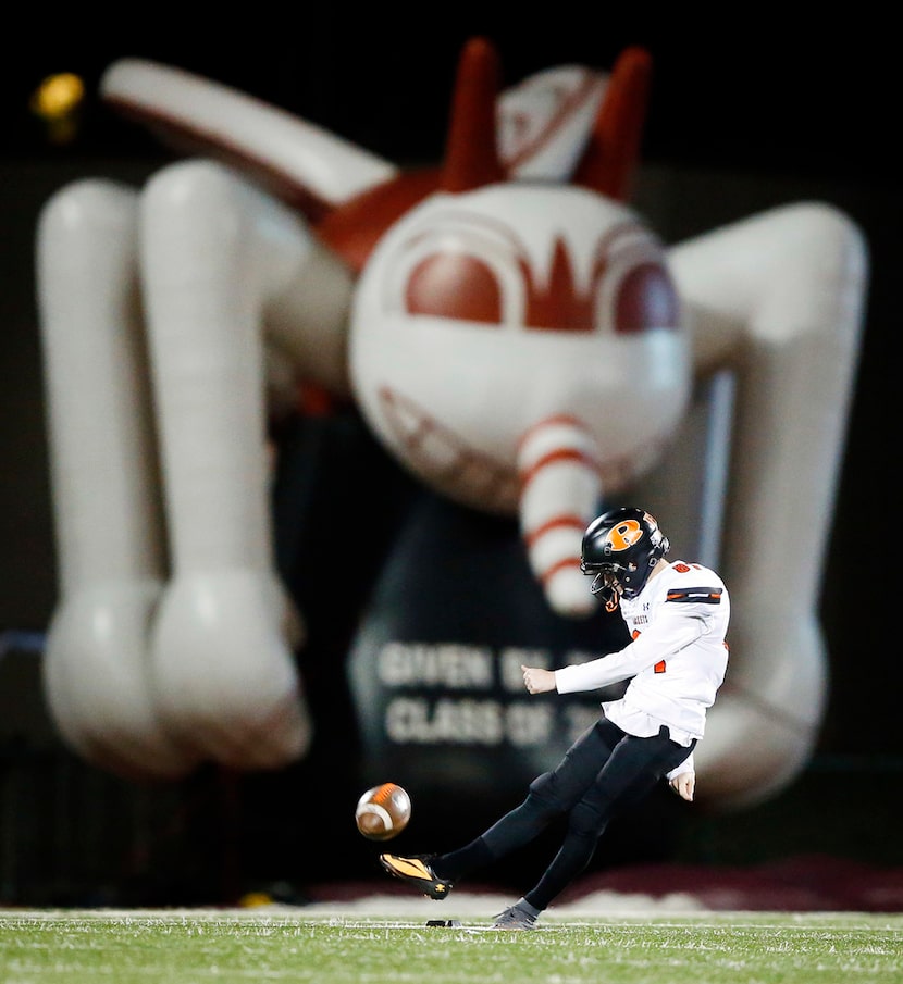 Rockwall kicker Ethan Spearman (81) kicks off to the Mesquite Skeeters during the first...