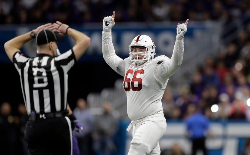 FILE - Stanford defensive tackle Harrison Phillips (66) celebrates after the Cardinal...