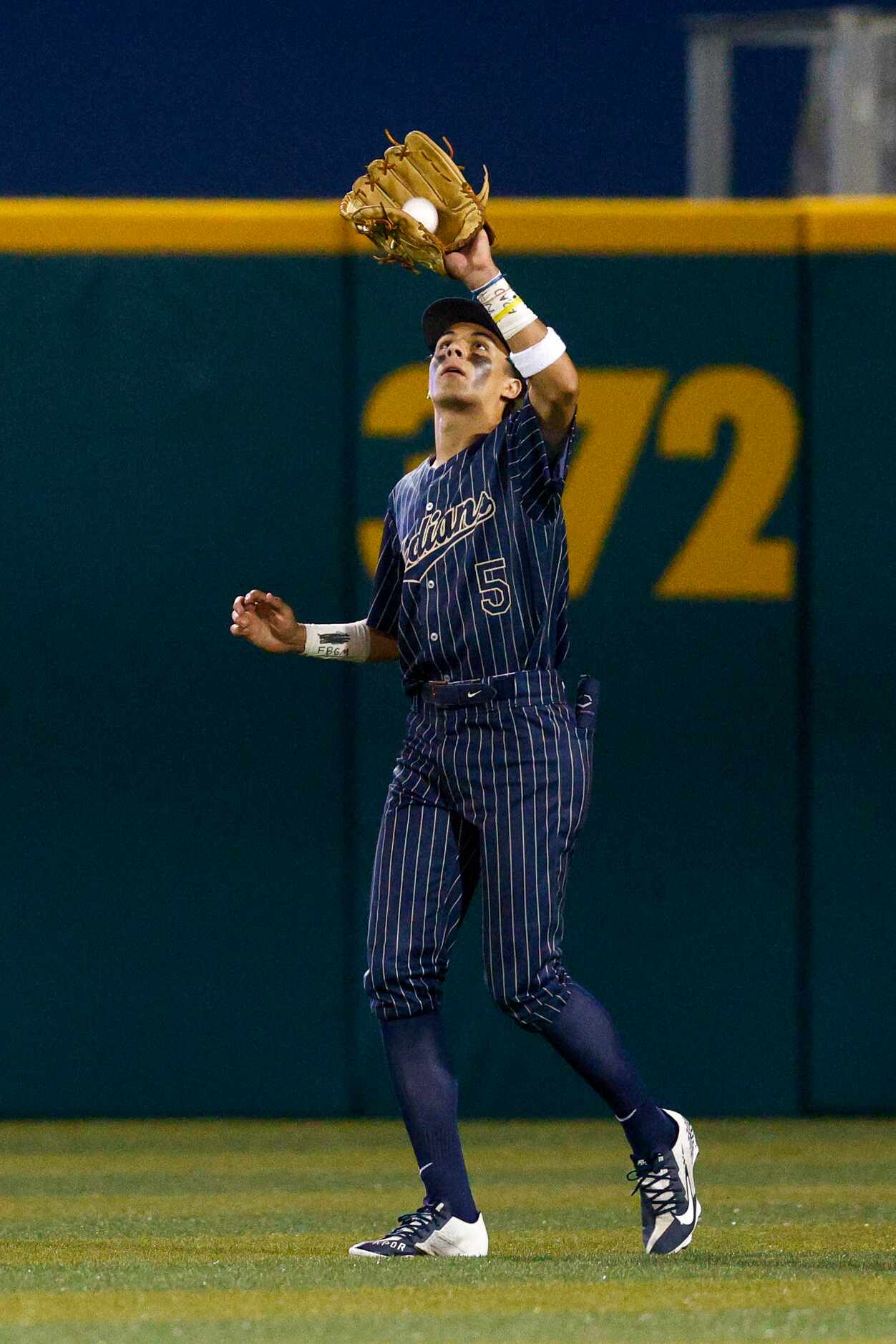 Keller centerfielder Jackson Hill (5) catches the ball for an out during the second inning...