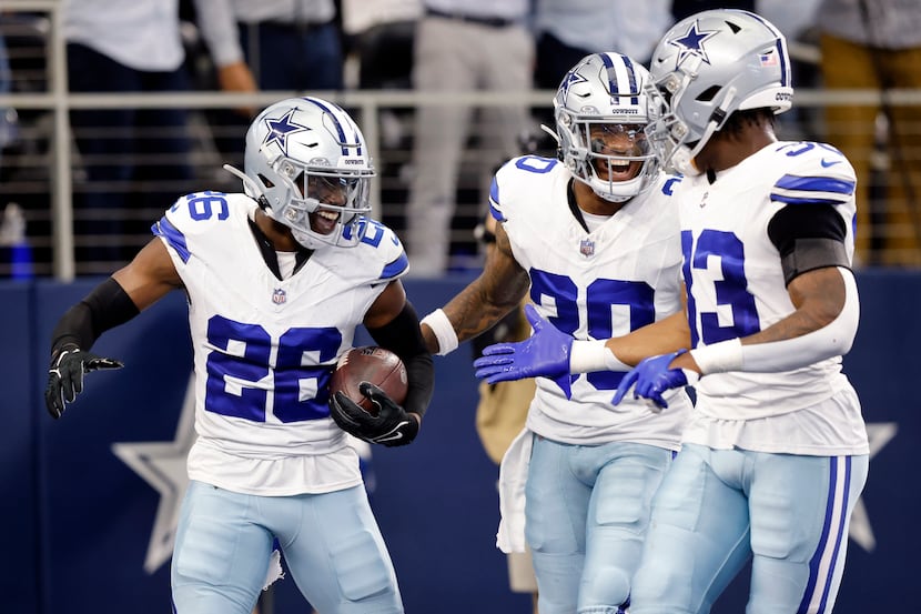 Dallas Cowboys cornerback DaRon Bland (26) celebrates a second quarter touchdown with safety...