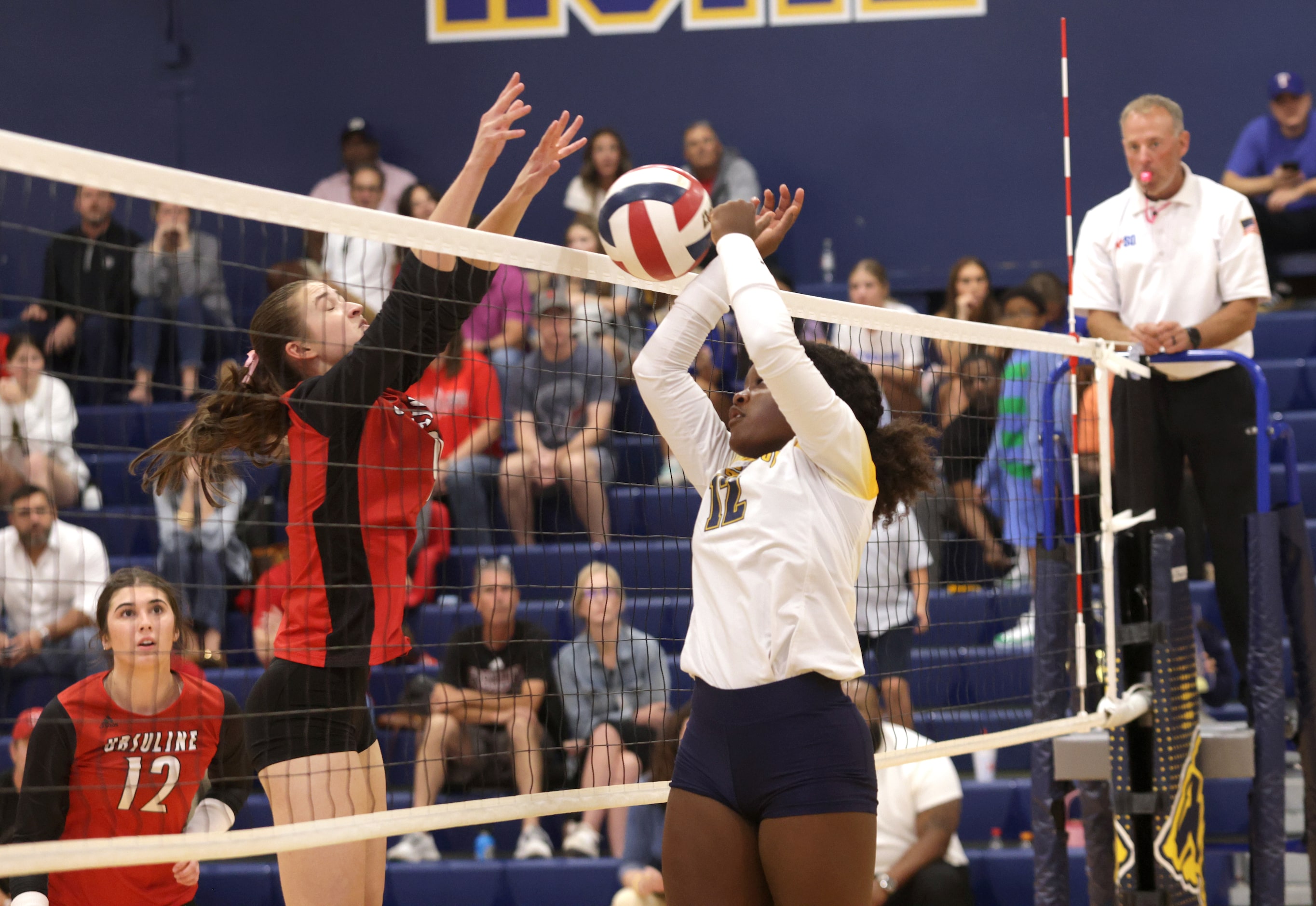 Ursuline player #9 Mckenzie Murray gets the ball past Prestonwood player #12 Taylor Cook...