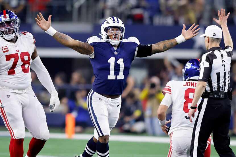 Dallas Cowboys linebacker Micah Parsons (11) celebrates his fourth quarter sack of New York...