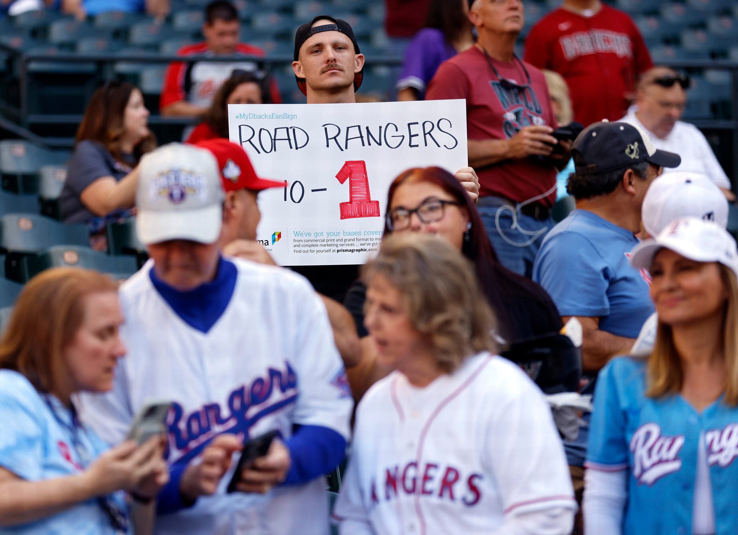 An Arizona Diamondbacks fan tries to jinx the Texas Rangers by predicting the teams first...