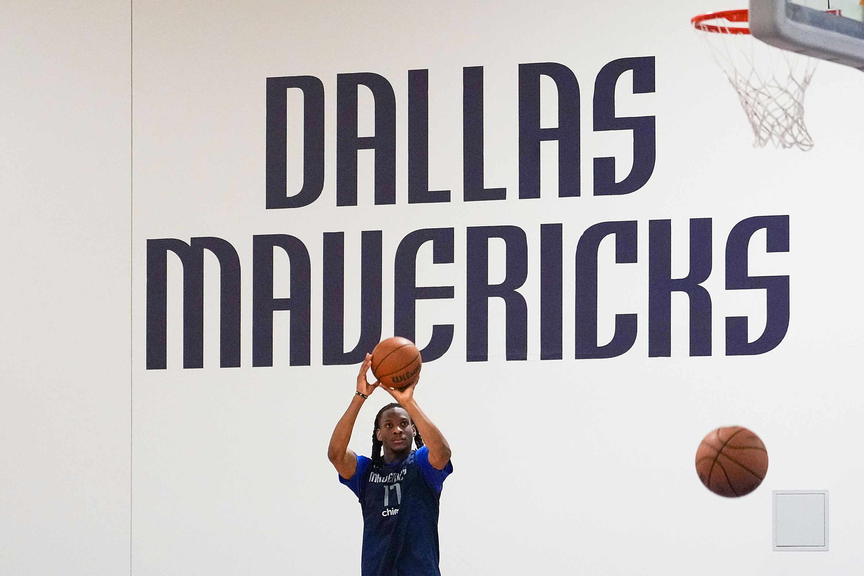 Dallas Mavericks forward Melvin Ajinca  participates in a practice in preparation for the...