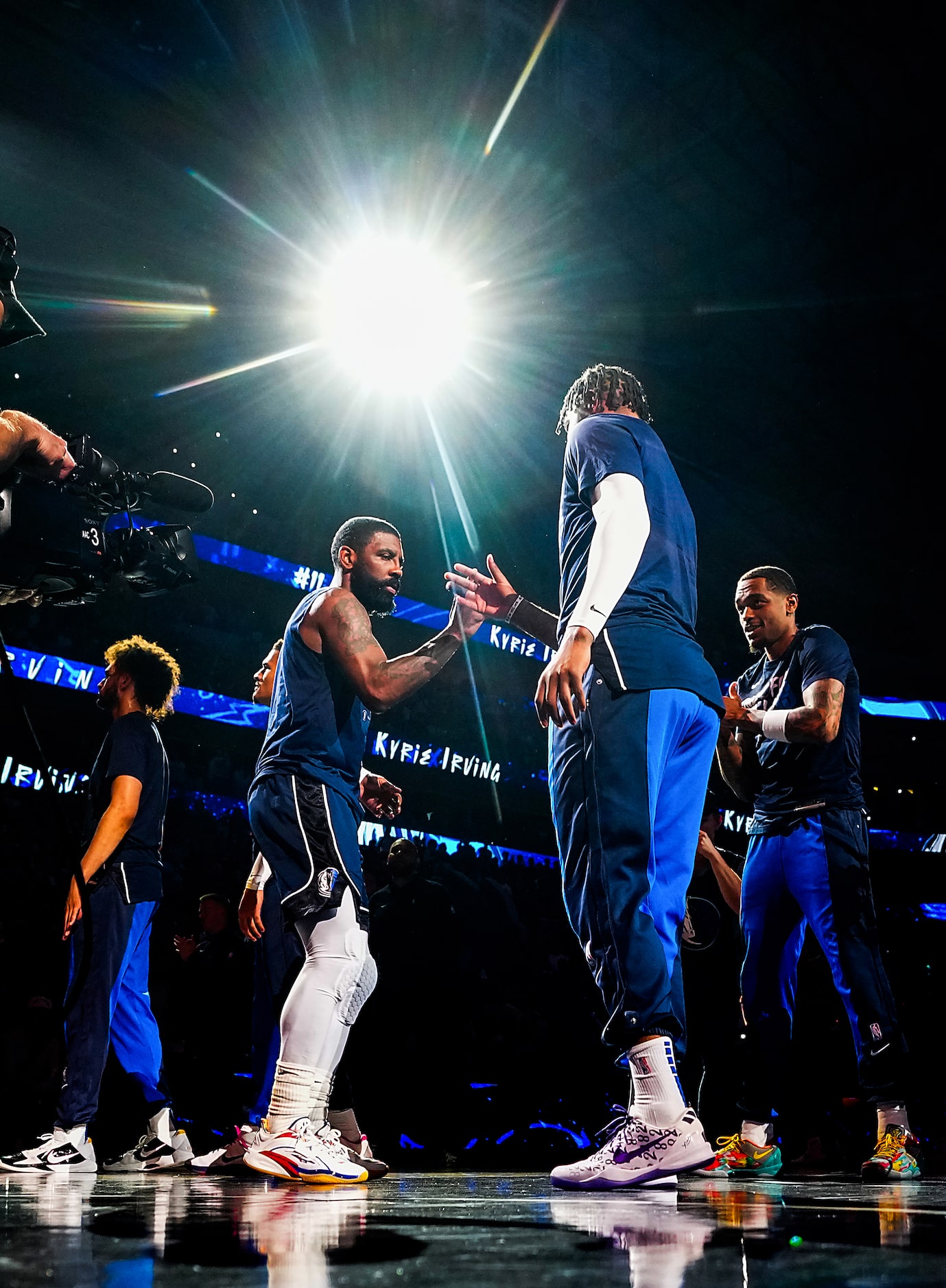 Dallas Mavericks guard Kyrie Irving (11) is introduced before Game 4 of an NBA basketball...