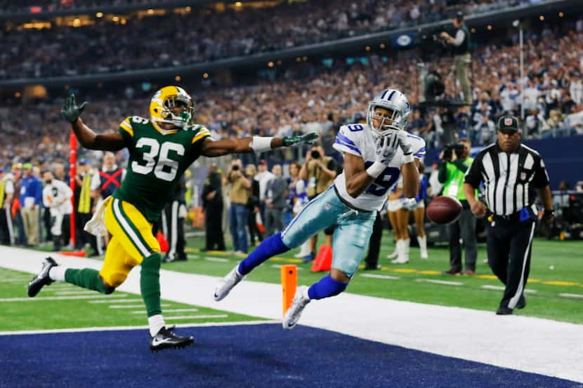 Green Bay Packers' LaDarius Gunter breaks up a pass intended for Dallas Cowboys' Brice...