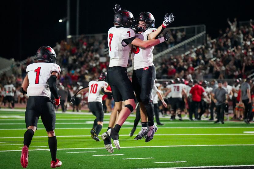 Melissa tight end Gunnar Wilson (7) celebrates with wide receiver Jacob Kusano (13) after...