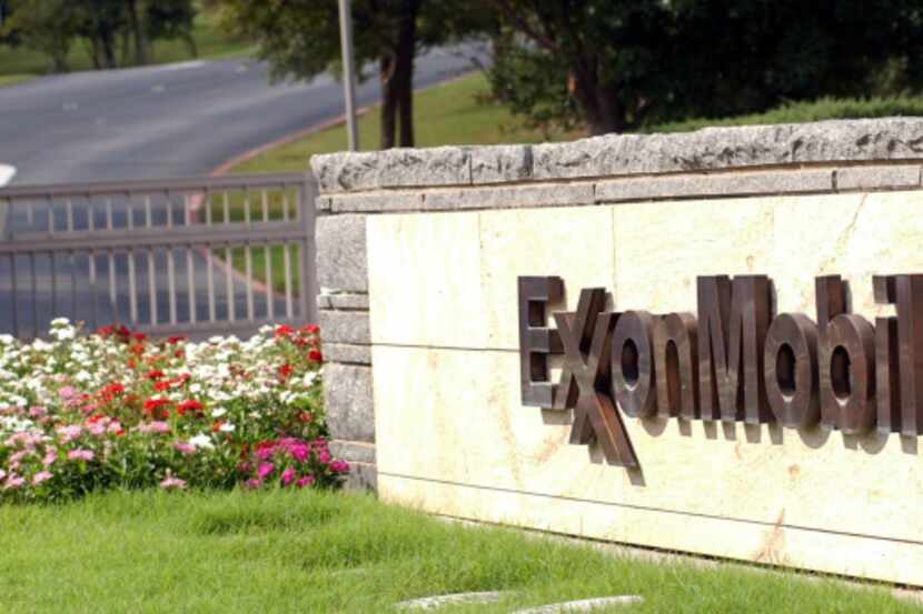 A sign marks the entrance of the Exxon Mobil corporate headquarters in Irving.