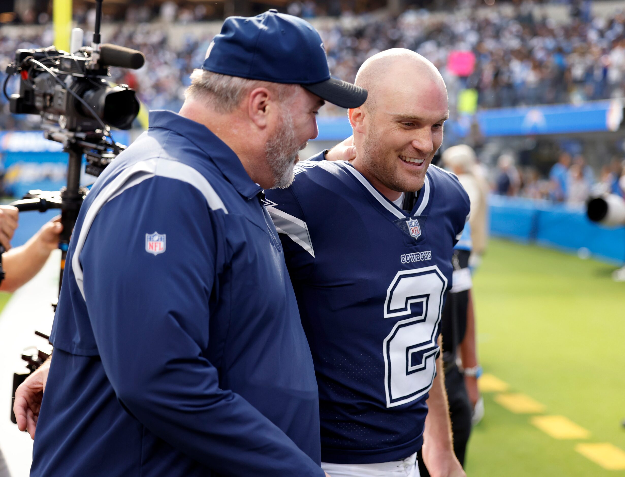 Dallas Cowboys place kicker Greg Zuerlein (2) is congratulated by head coach Mike McCarthy ...