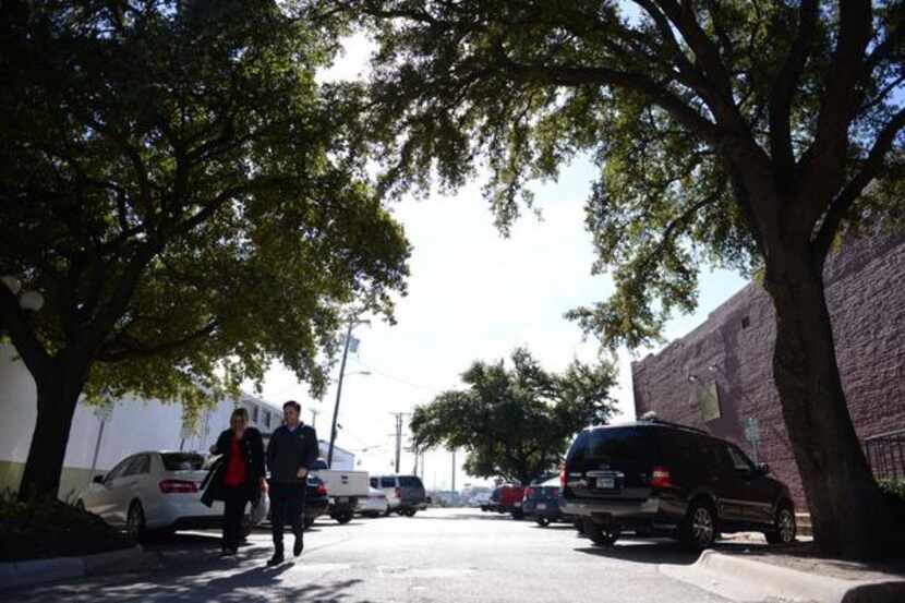 
Pedestrians walk down S. San Jacinto Street in downtown Rockwall, which will soon be turned...