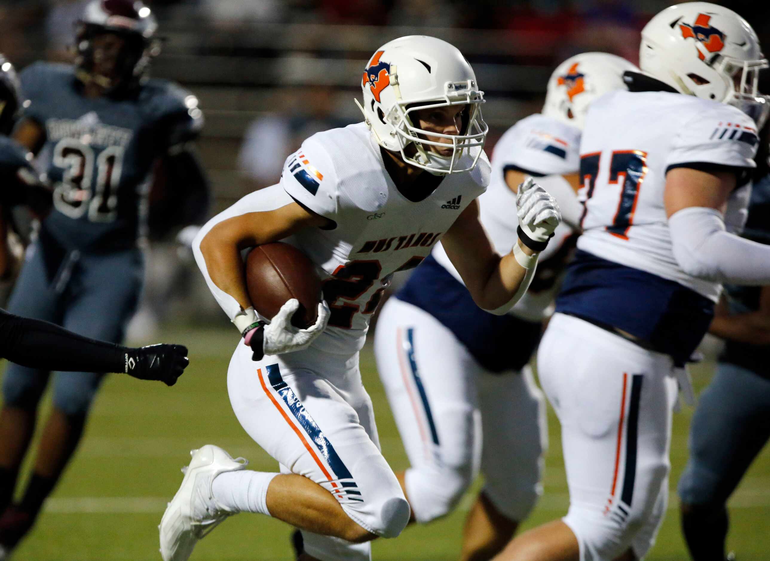 Sachse RB RC Reeves (24) breezes through the Rowlett defense in route to another touchdown...