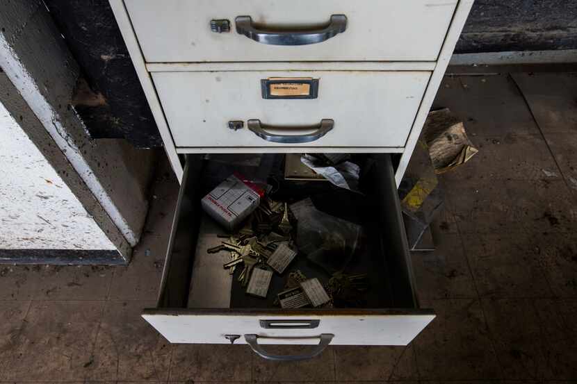 A collection of unused keys lays in a file cabinet drawer of a fifth floor maintenance area...
