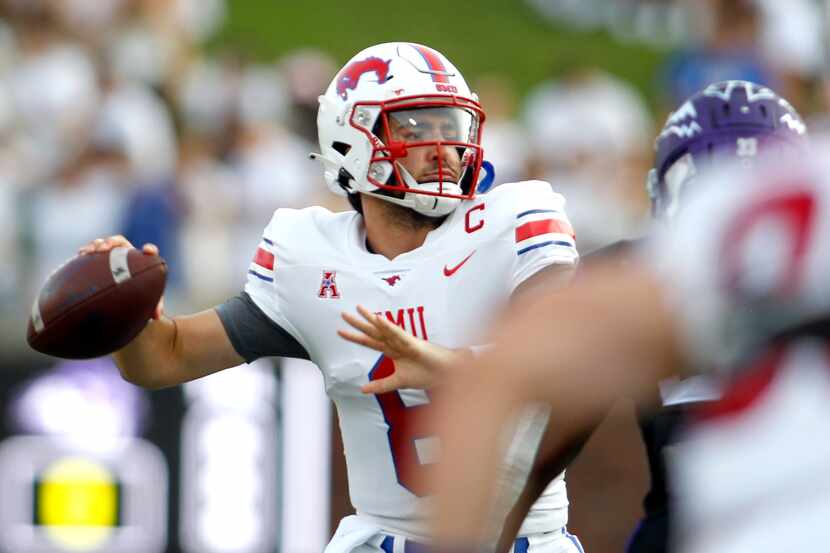 SMU quarterback Tanner Mordecai (8) looks to pass during the first half against Abilene...