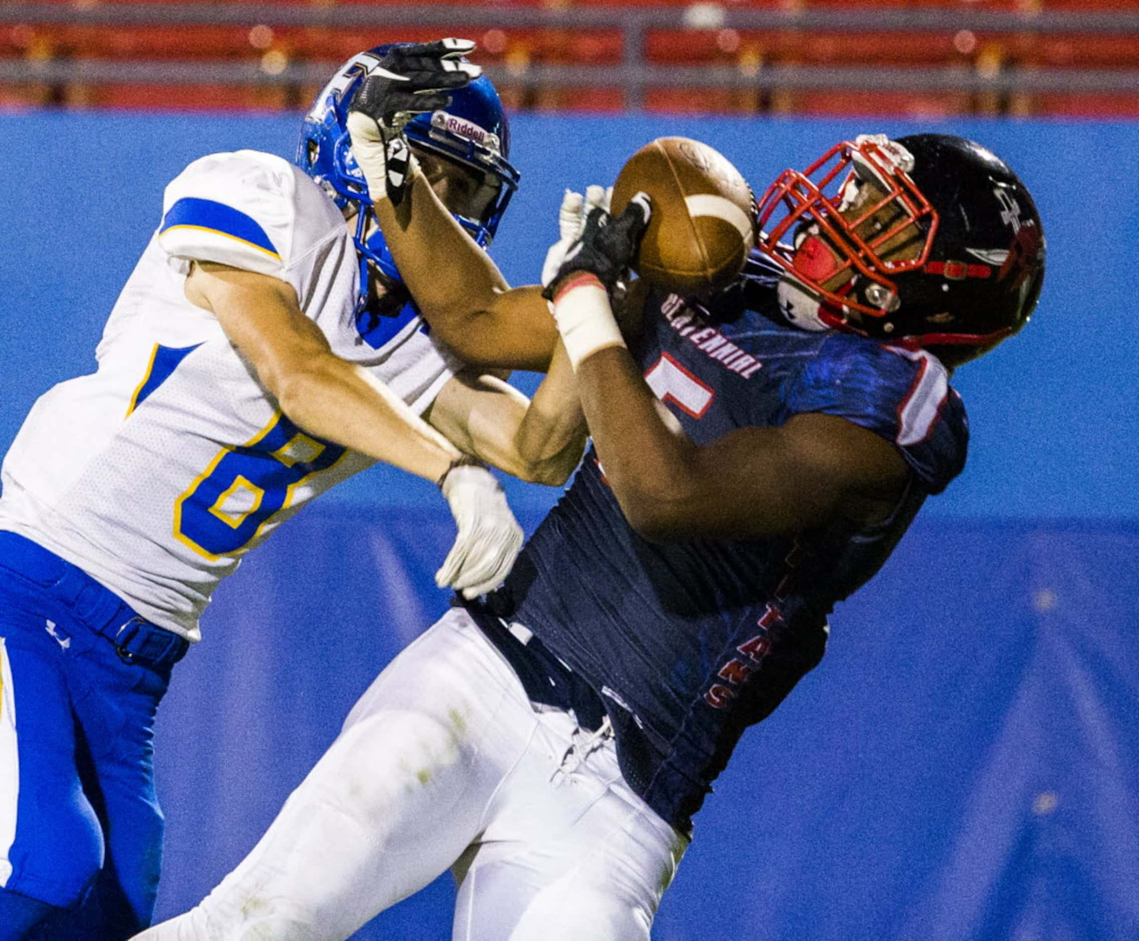 Frisco Centennial wide receiver Kenny Nelson (5) catches a pass in the end zone for a...