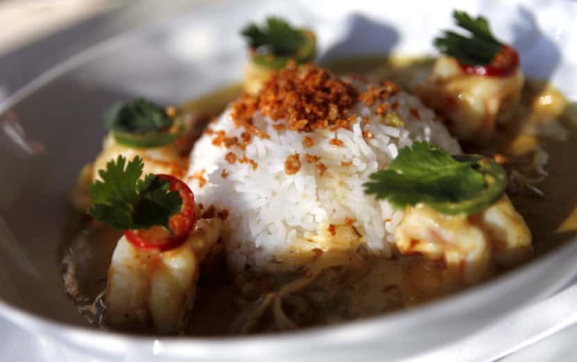 Assam curry prawns at Five Sixty by Wolfgang Puck are swimmingly fresh shrimp in a rich,...