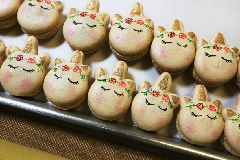 The unicorn macarons sell for $4 each at Bisous Bisous Patisserie.
