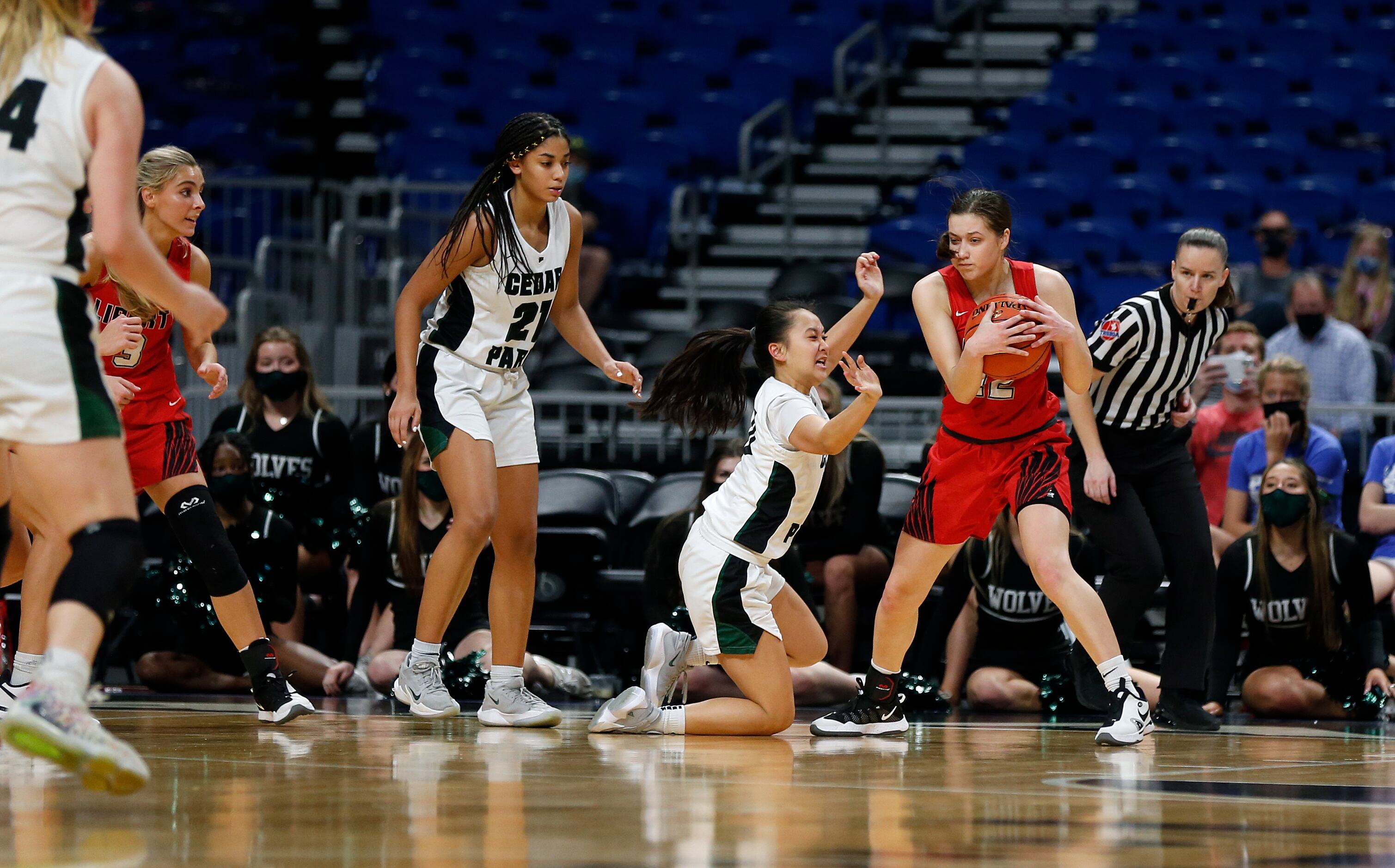 Frisco Liberty Ashley Anderson #12 steals the ball from Cedar Park Molly Ly #00. Frisco...