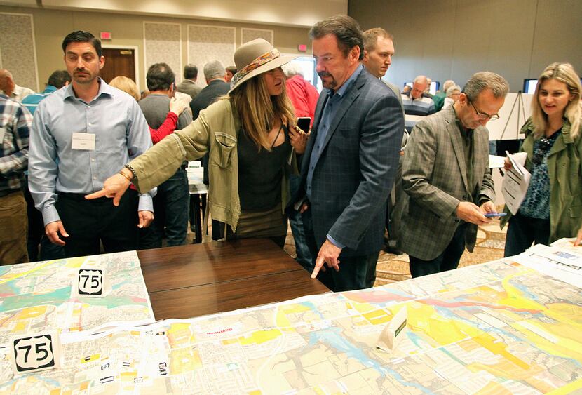 McKinney Mayor George Fuller (right) and his wife Maylee look over maps Thursday. (Stewart...