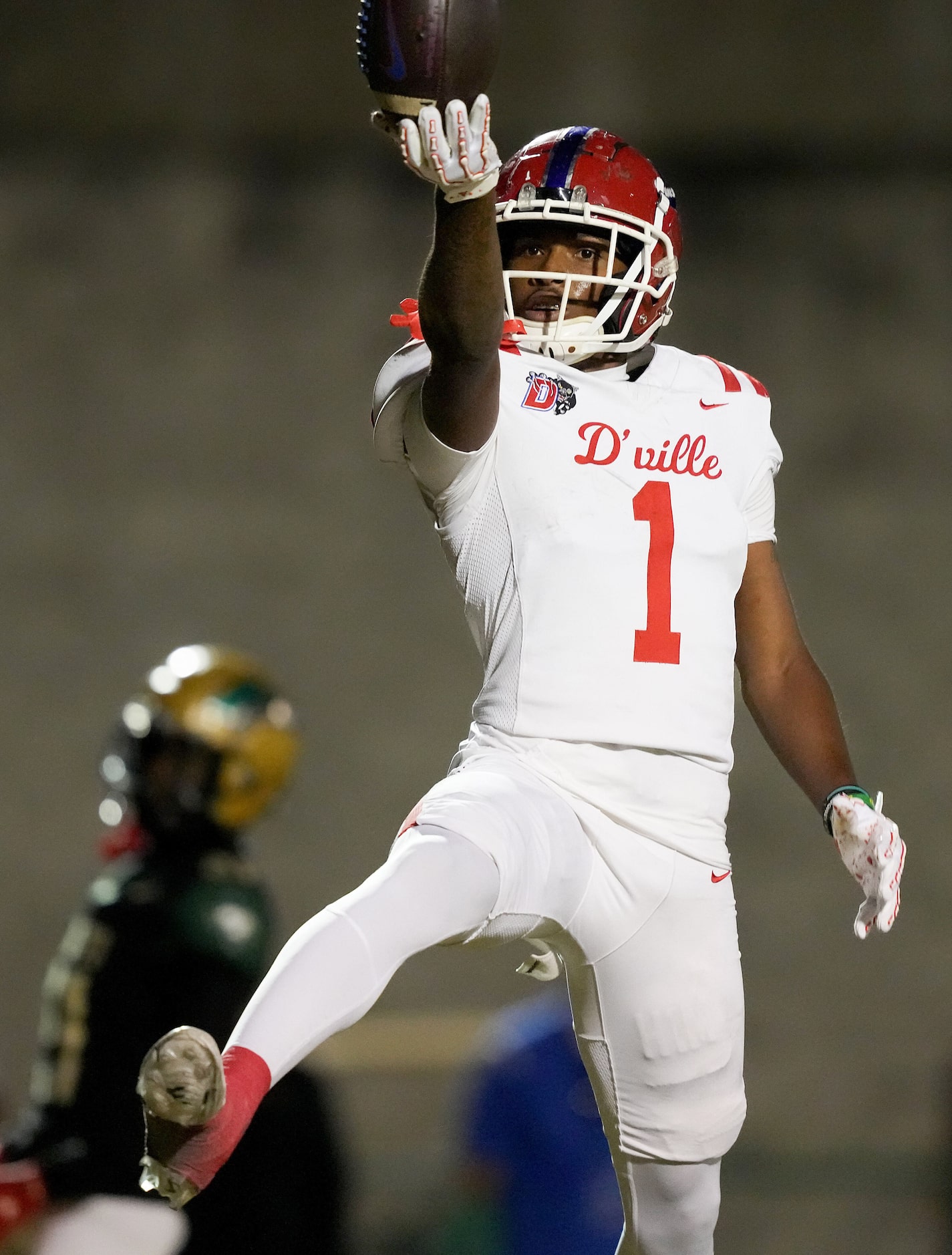 Duncanville wide receiver Dakorien Moore (1) celebrates after scoring on a 66-yard touchdown...