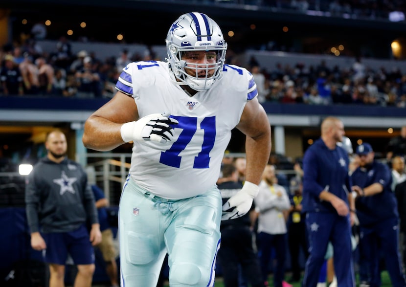 FILE - Cowboys offensive tackle La'el Collins (71) runs through drills during pregame...