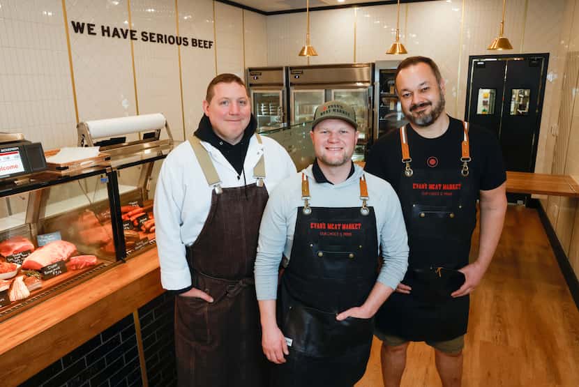 Owner Evan Meagher (center) stands with head butcher Michael Lawson (left) and store manager...