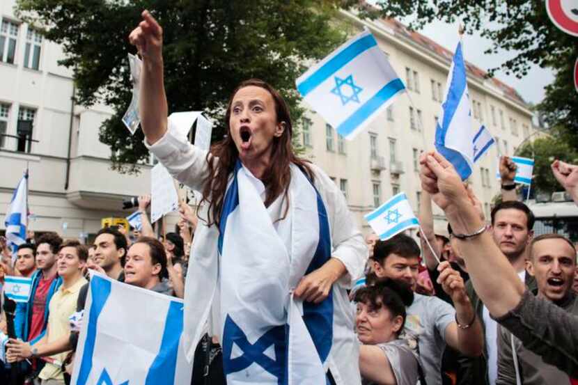 
Pro-Israel demonstrators shouted slogans at a pro-Palestinian rally in Berlin on Friday....