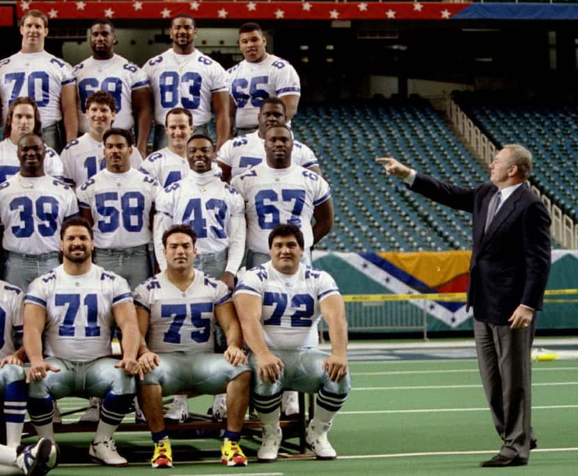 1/25/94--ATLANTA, GA.--Dallas Cowboys'  owner Jerry Jones directs players into position...