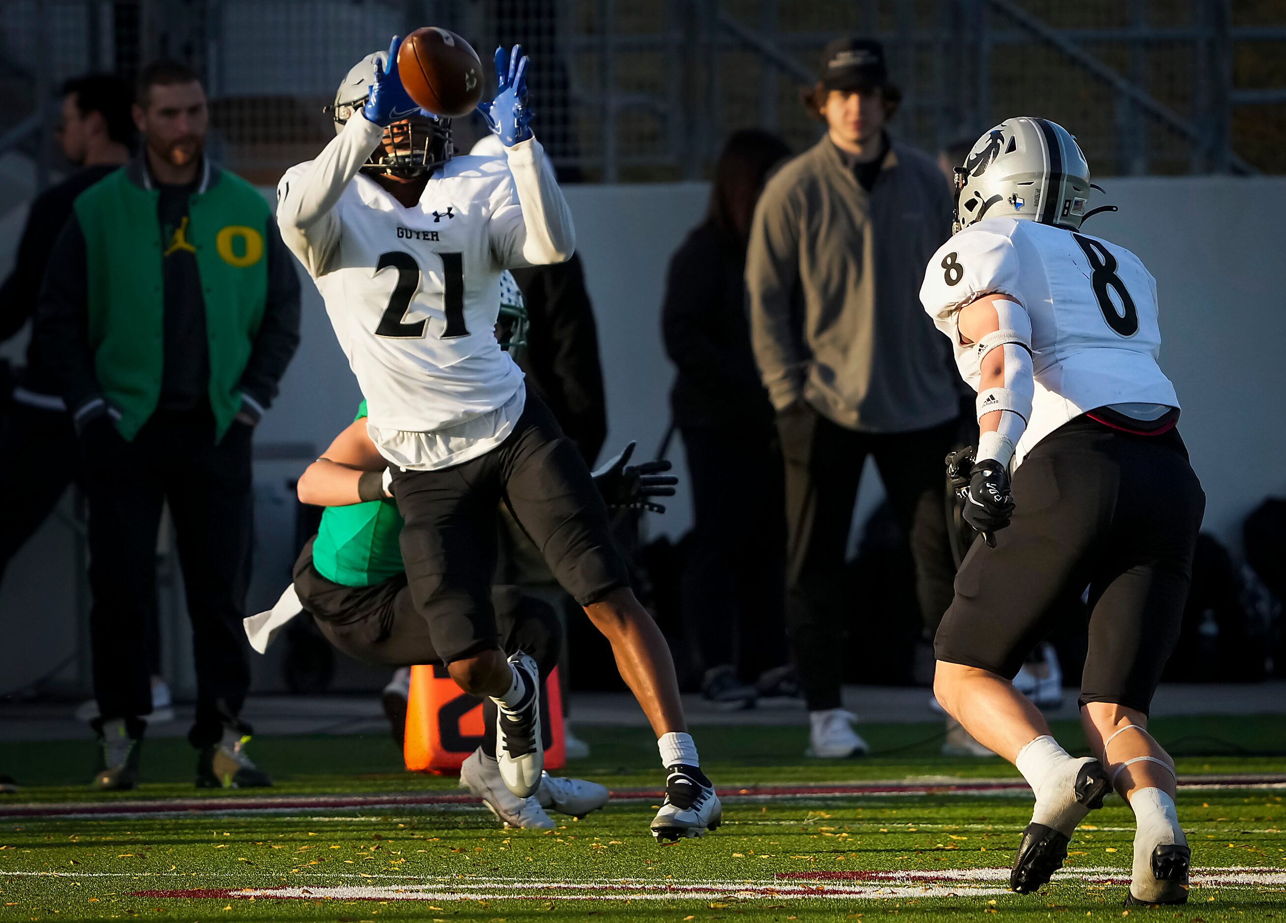 Denton Guyer defensive back Ryan Yaites (21) intercepts a pass by Southlake Carroll...