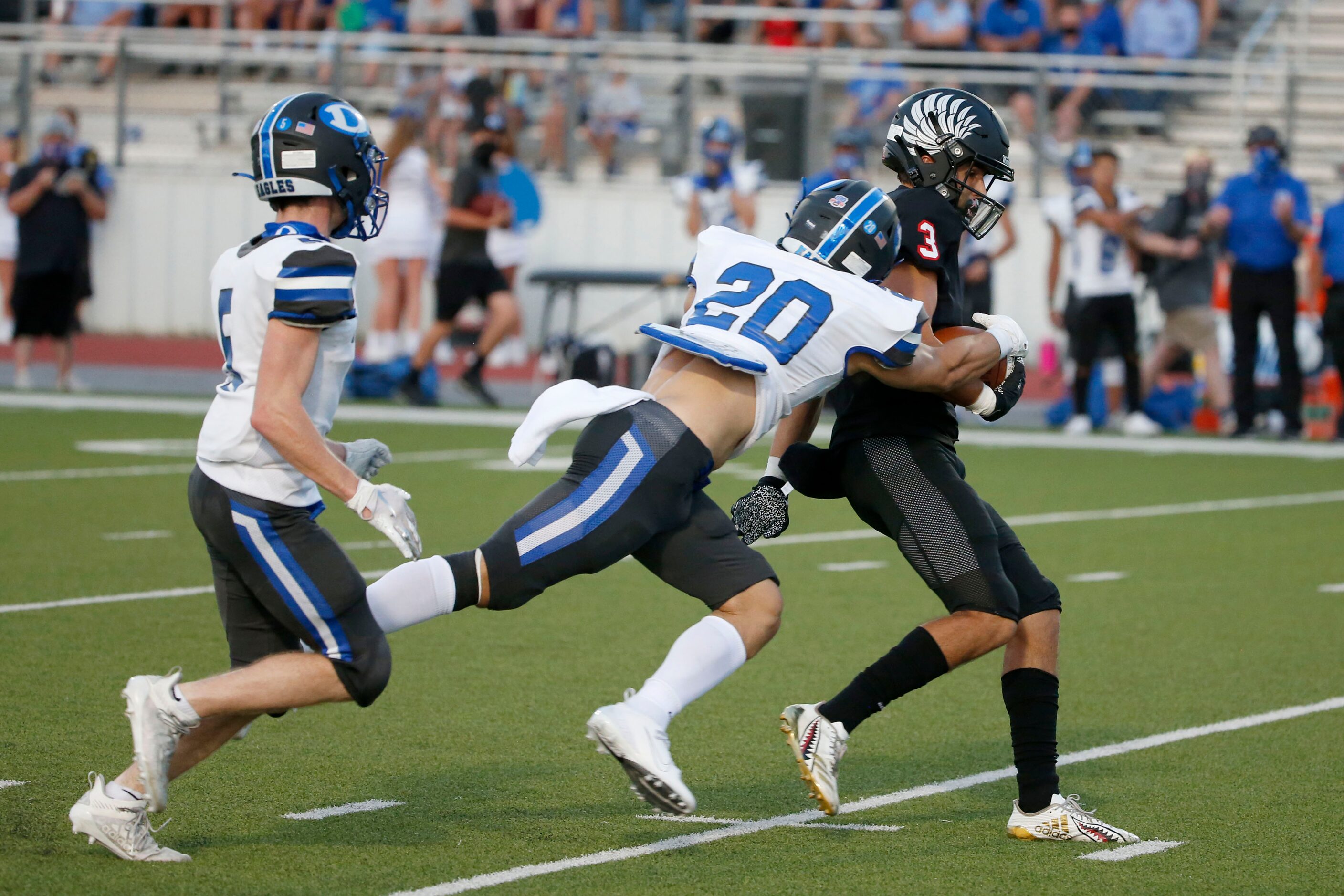 Argyle receiver Cash Walker (3) breaks away from Decatur's James Lewis (5) and Jackson...