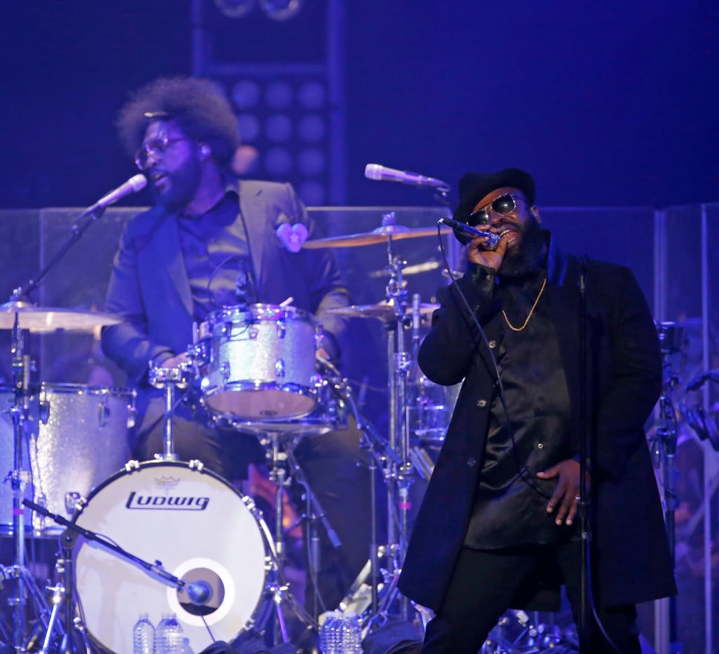 Black Thought (right) and Questlove, of The Roots, perform with the Dallas Pops at Toyota...