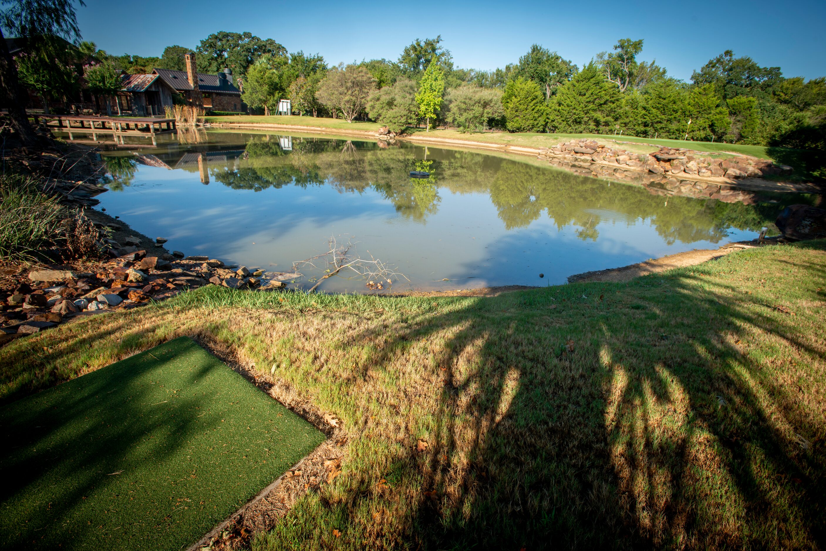 Golf tee, water hazard and green at 5101 Kensington Ct., in Flower Mound, Texas on August...