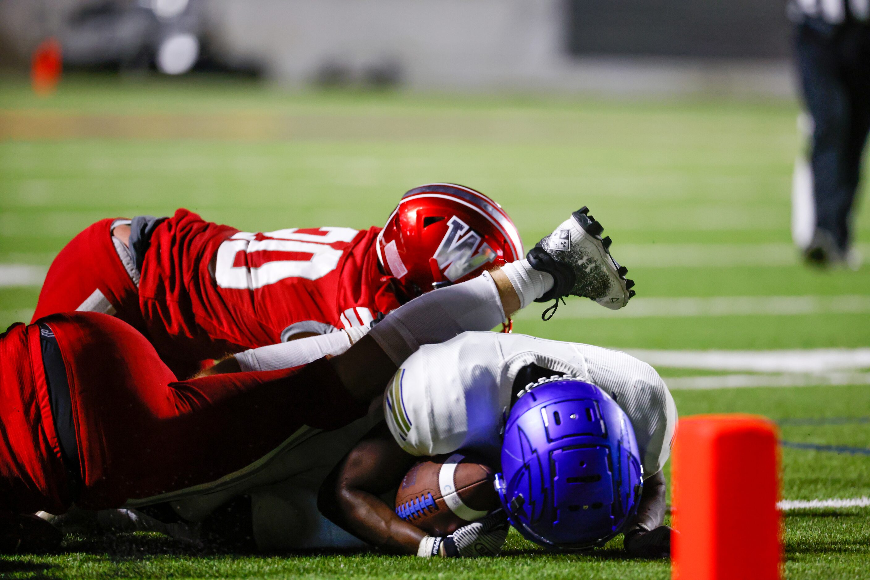 Conrad running back Carlos Walker (2) lands just short of the end zone during the first half...