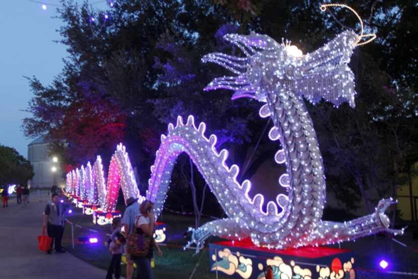 The "Porcelain Dragon," which is made of porcelain platters, cups and spoons, glittered...