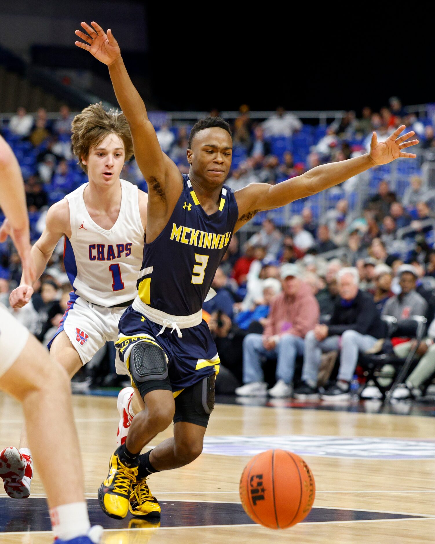 McKinney guard Jacovey Campbell (3) loses the ball as he drives past Austin Westlake guard...