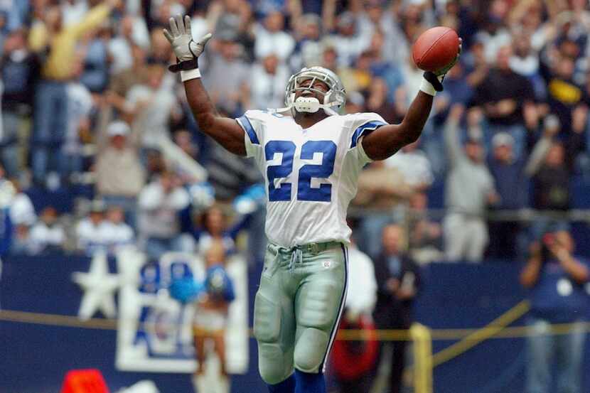 Cowboys running back Emmitt Smith celebrating after breaking the all-time rushing record in...