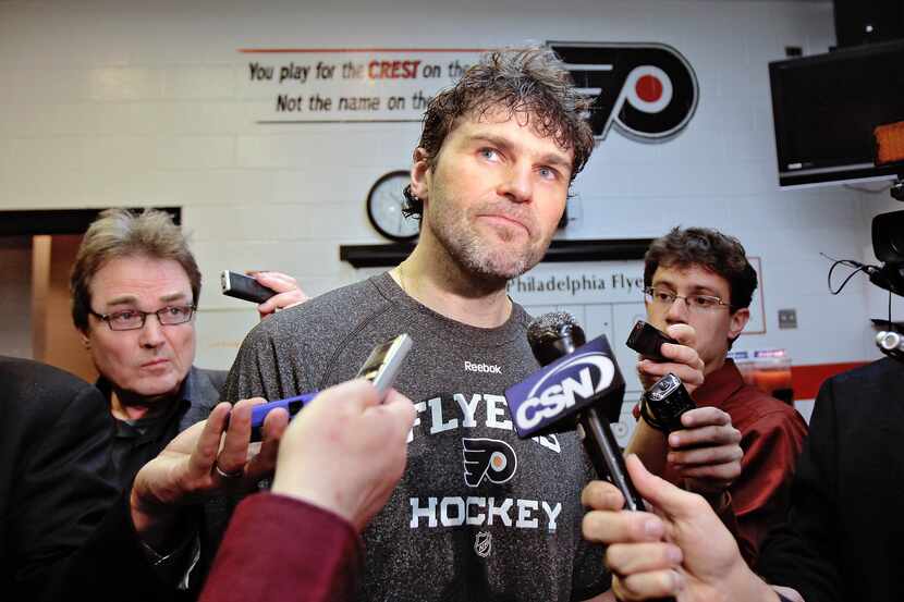 Jaromir Jagr #68 of the Philadelphia Flyers speaks to the media after being defeated 3-1 by...