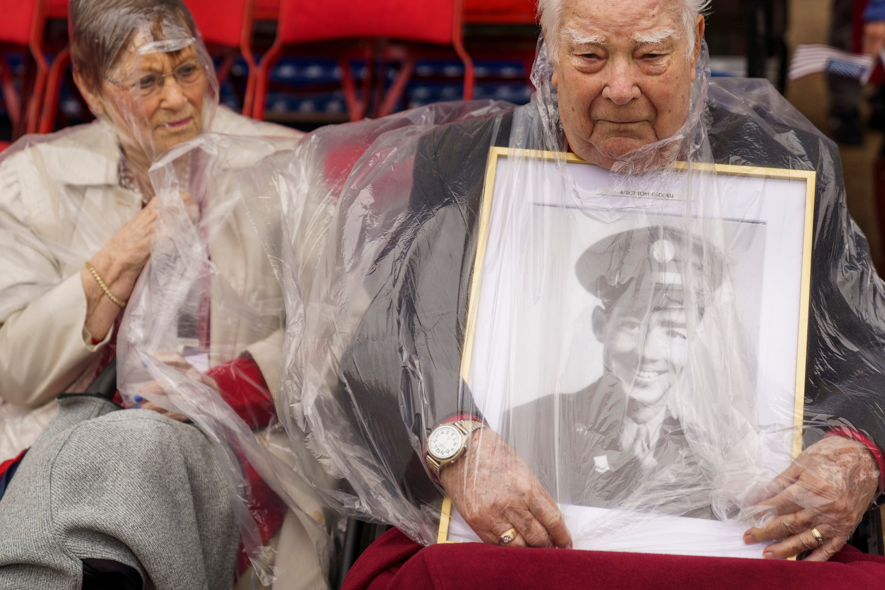 Jack Caddell holds a photograph of his brother, S. Sgt. Tony Caddell, a member of the Army...