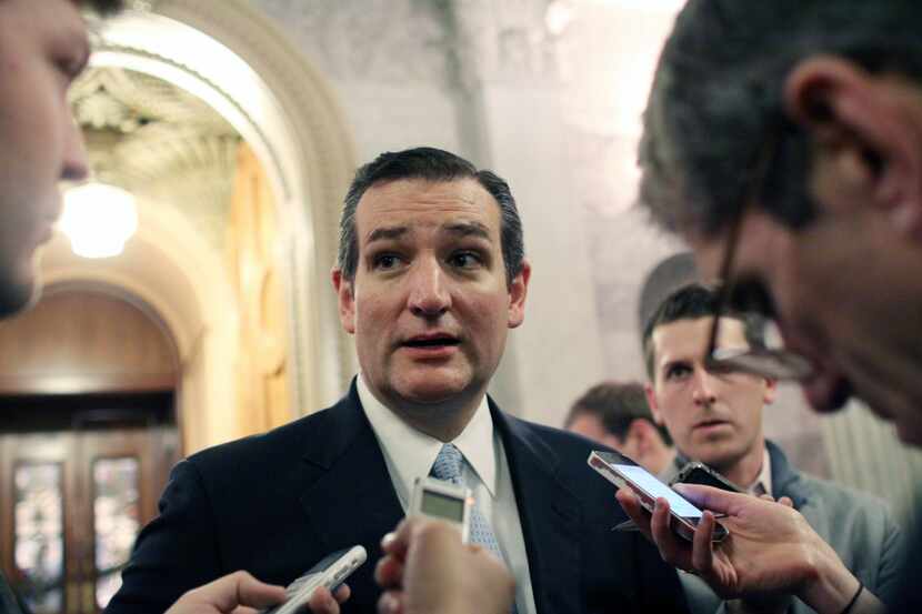 Sen. Ted Cruz (R-TX) talks with reporters after the Senate voted on a $1.1 trillion spending...