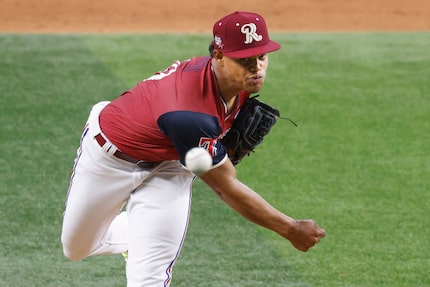 American League's pitcher Winston Santos (40)(TEX) delivers during the seventh inning of the...