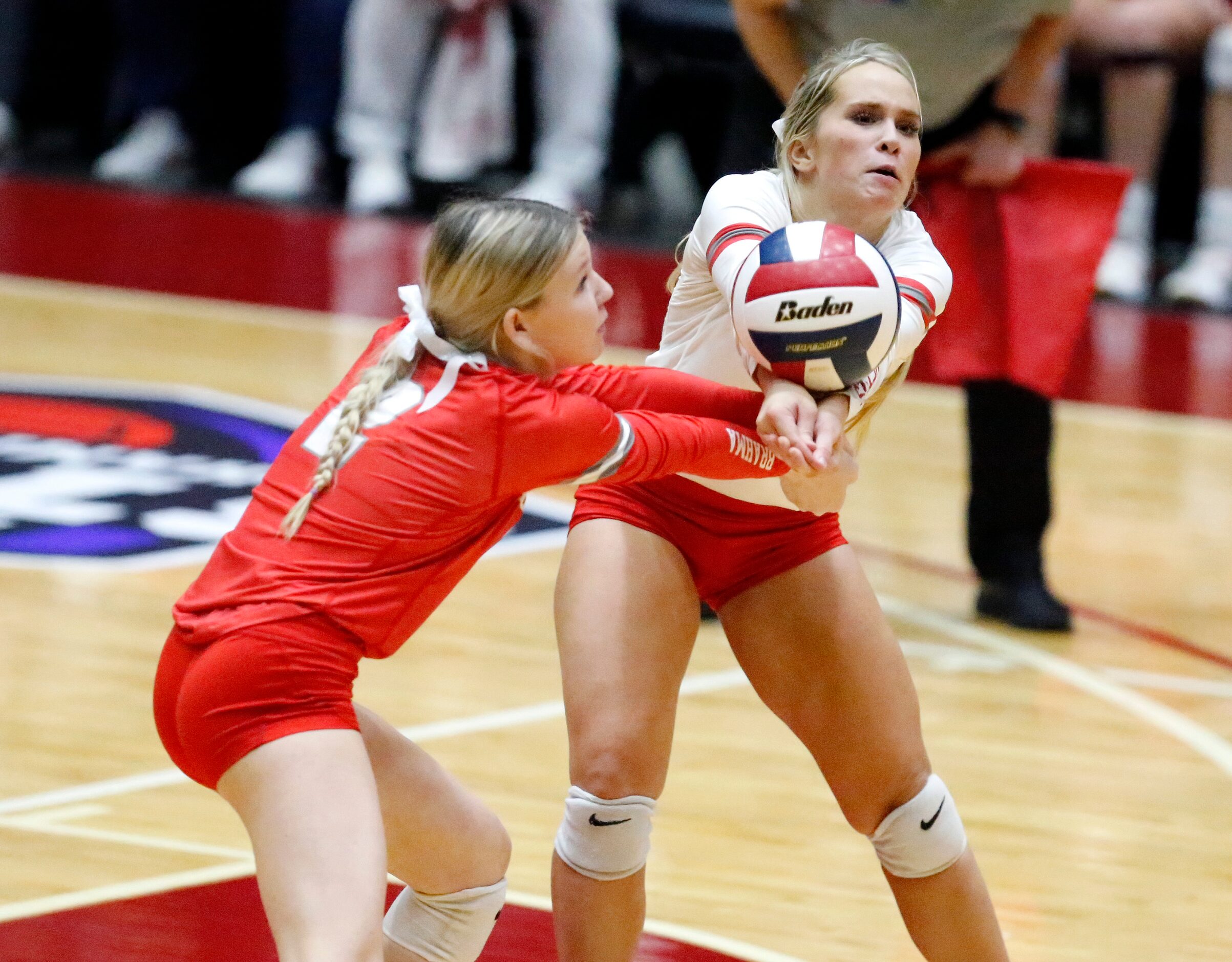 Bellville High School defensive specialist Emmy Novicke (2)  and Bellville High School liber...