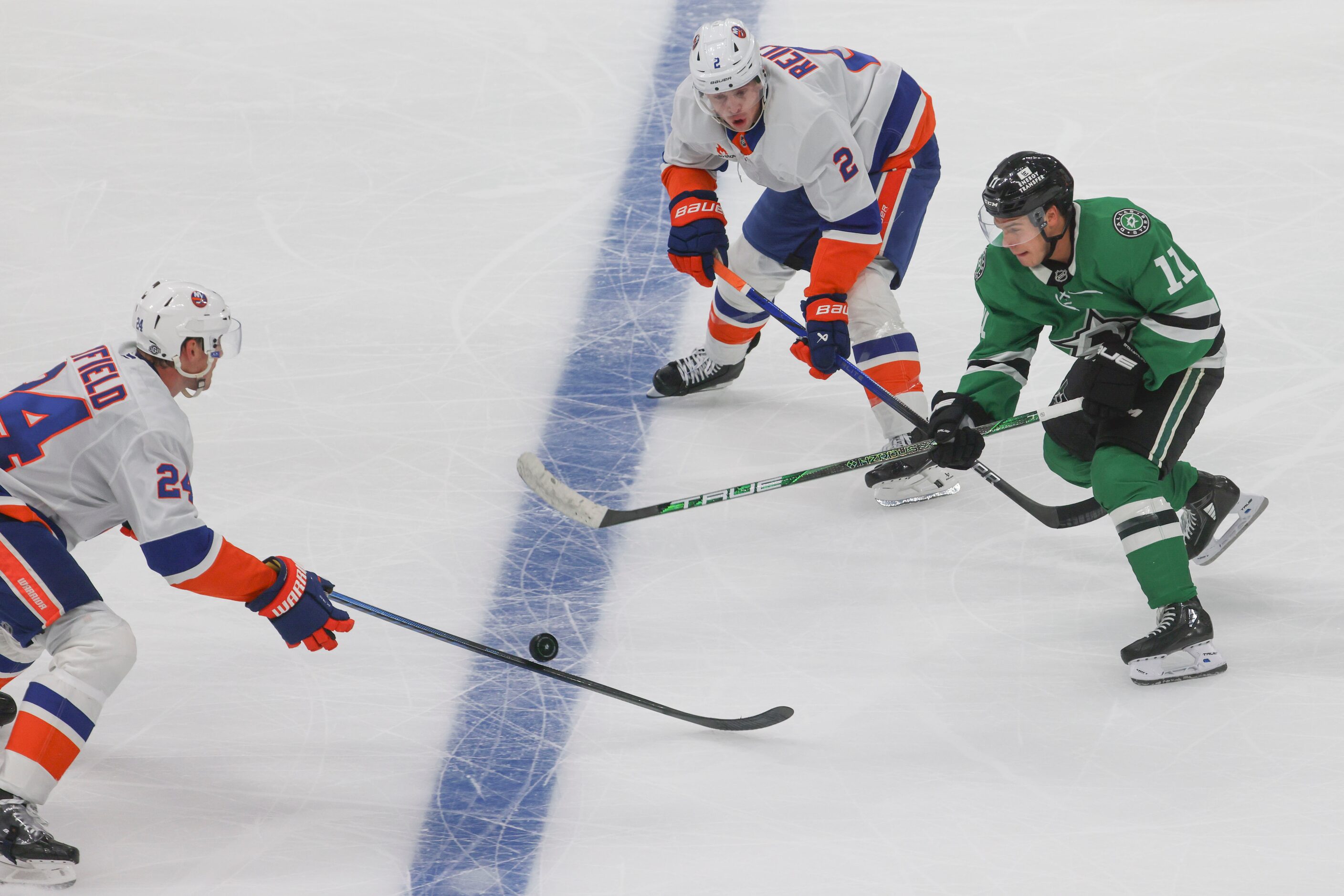 Dallas Stars center Logan Stankoven (11) goes the down the rink against New York Islanders...