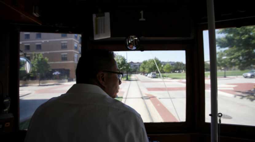 Motorman Arthur Torres watches the road while driving the McKinney Avenue Trolley in Dallas,...