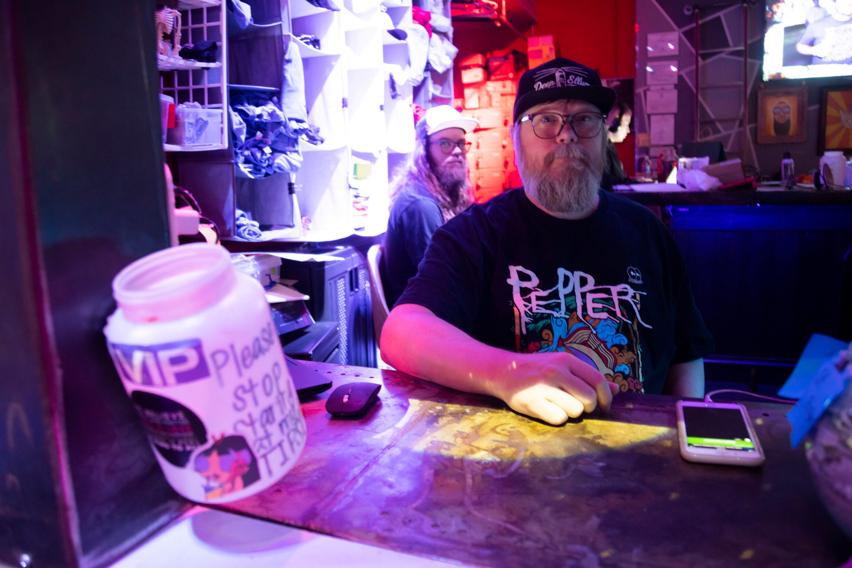 Co-founder John LaRue poses for a photo at the entrance of Deep Ellum Art Co. in Dallas on...