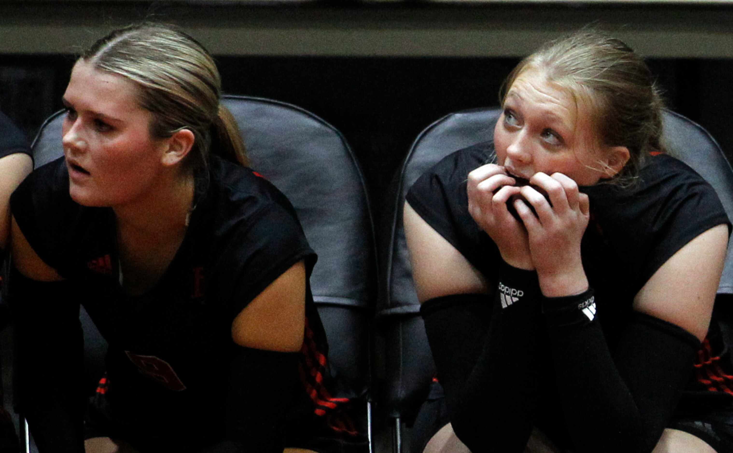 Lucas Lovejoy senior Anna Drescher (12), right, watches nervously from the team bench area...