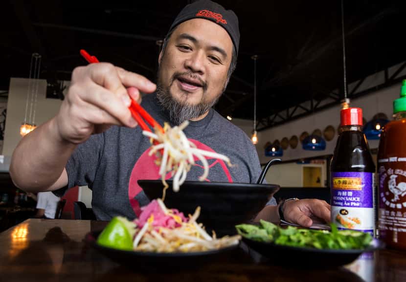 Owner Khanh Nguyen of Dalat Restaurant adds sprouts to his pho.