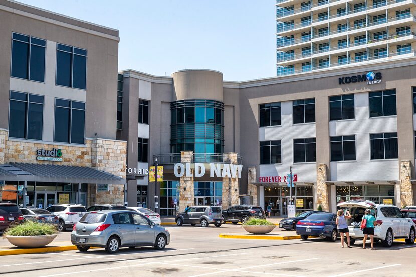 Cars come and go at The Shops at Park Lane in Dallas on Thursday.