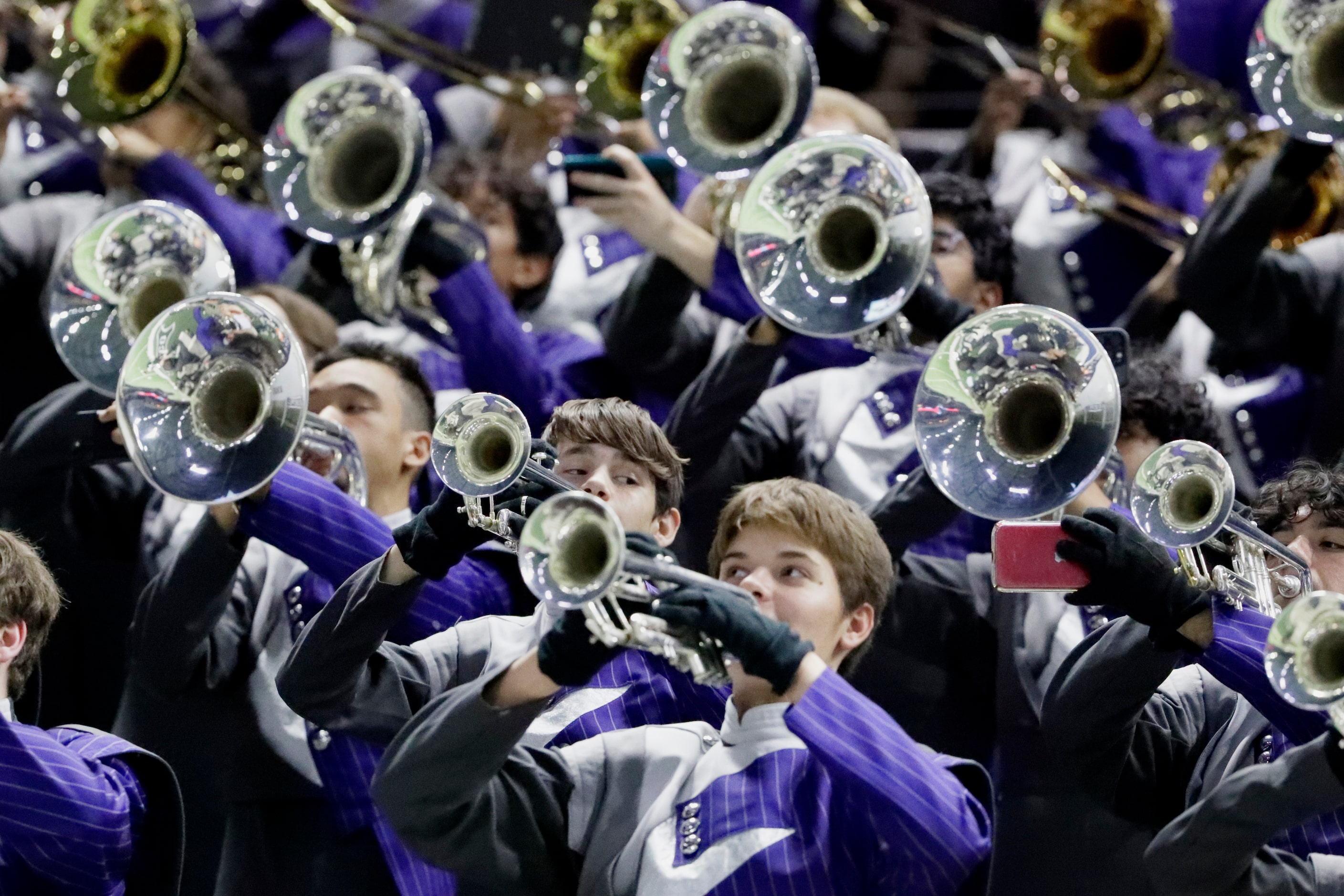 The Lone Star High School marching band performs in the stands during the first half as Lone...