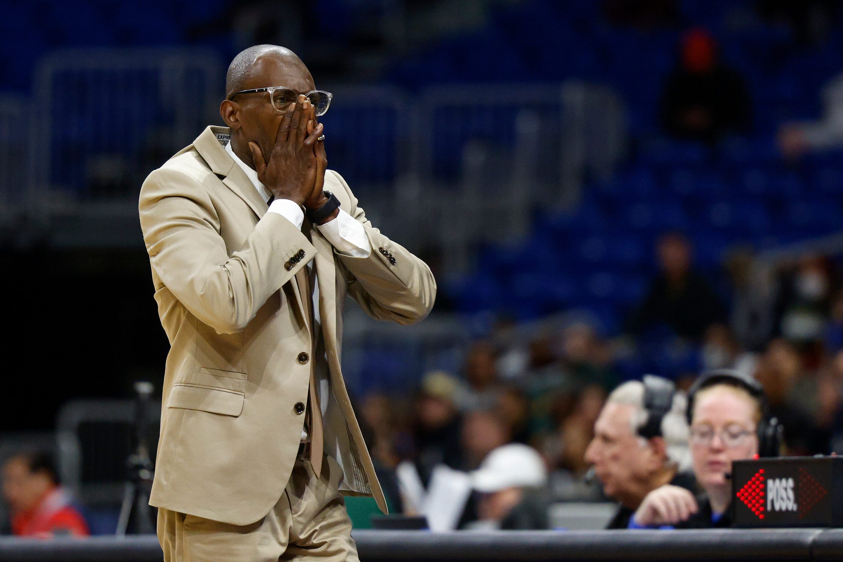 Madison head coach Damien Mobley reacts after a foul called against Madison during the...