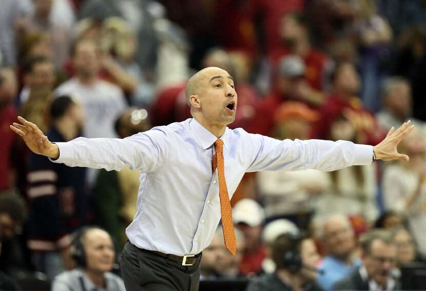 KANSAS CITY, MO - MARCH 07:  Head coach Shaka Smart of the Texas Longhorns reacts from the...